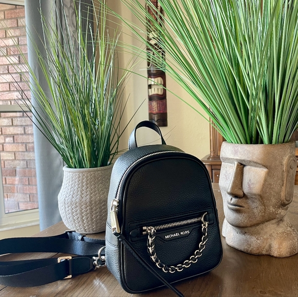 Michael Kors Handbags - $258 Michael Kors Elliot XS Leather Convertible Messenger Backpack ( NWT )